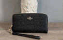 COACH LONG ZIP AROUND WALLET IN SIGNATURE LEATHER - CCL35 - GOLD/BLACK - Like New