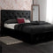 DHP DAKOTA QUEEN UPHOLSTERED BED WITH STORAGE DRAWERS IN BLACK FAUX LEATHER - Like New