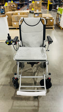 KERDOM FOLDING POWER CHAIR "WORLD'S LIGHTEST" 12AH AIRLINE APPROVAL - SILVER - Like New
