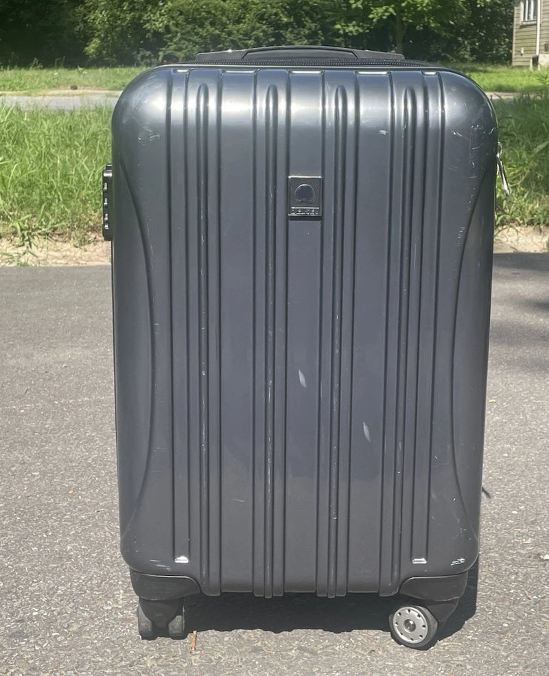 DELSEY PARIS HELIUM AERO HARDSIDE EXPANDABLE LUGGAGE 8 SPINNER WHEELS - TITANIUM - Like New