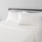 AMAZON BASICS 4 PIECE DELUXE MICROFIBER BED SHEETS QUEEN SIZE, SOLID - CREAM - Brand New