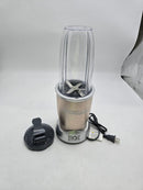 NUTRIBULLET PRO 900 WATT - 13-PIECE HIGH-SPEED BLENDER/MIXER SYSTEM - CHAMPAGNE - Like New