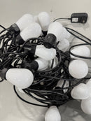 EAVELIGHT 100FT SMART OUTDOOR PATIO LIGHTS WITH REMOTE, BLACK/WHITE - Like New