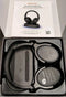 NOUUI BLUETOOTH HEADPHONES WITH TRANSMITTER CHARGING DOCK - BLACK - Like New