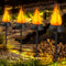 ANMEIX SOLAR CHRISTMAS LIGHTS OUTDOOR UPGRADED SOLAR TORCH LIGHTS 4 PACK BLACK - Like New