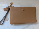 COACH ESSENTIAL SMALL WRISTLET, PEBBLED LEATHER IN HONEY - BROWN - Like New
